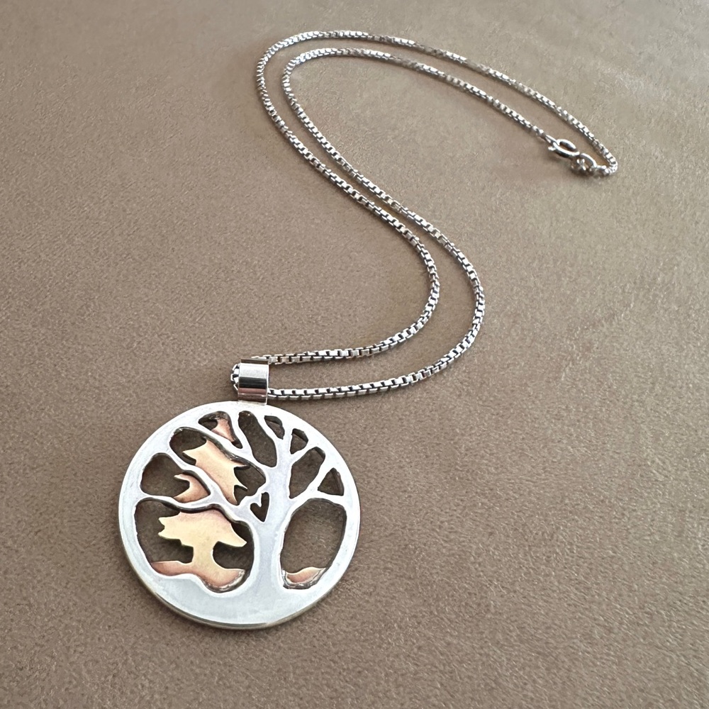 Artisan-made tree pendant, sterling and copper